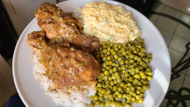 Smothered meat seafood or vegetables over rice