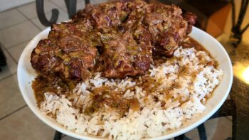 Oxtails Smothered in gravy over rice