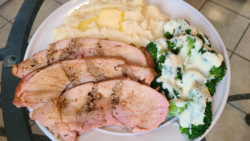 Seasoned Oven Roasted sirloin pork roast with mashed potatoes and white cheddar broccoli & cheese